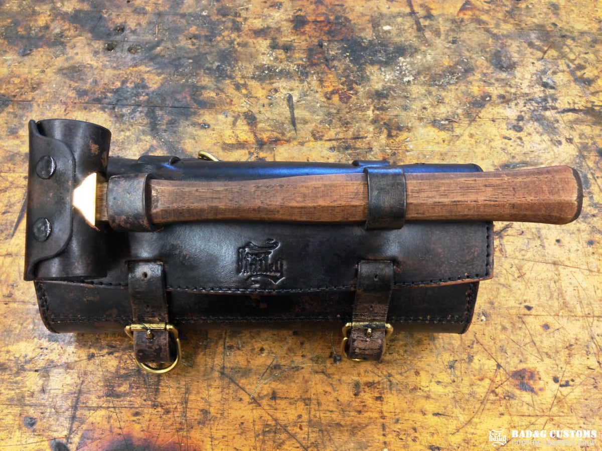 We’re proud to showcase a custom-made seat and saddlebags set crafted specifically for Doug Wothke, the legendary round-the-world motorcycle traveler. Made from hand-tooled and antiqued veg-tan leather, this set took countless hours of expert craftsmanship to complete. Designed for both durability and vintage authenticity, it will accompany him on the 2014 Cannonball Motorcycle Race, as he tackles this grueling challenge aboard his classic Harley-Davidson JD motorcycle. A true tribute to adventure!