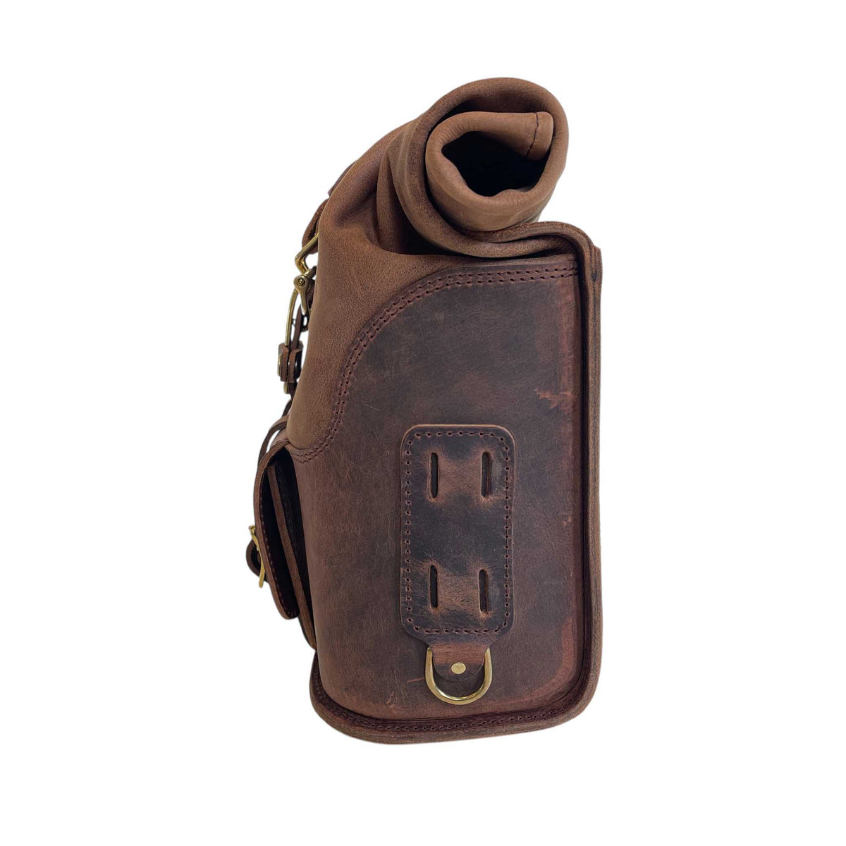 Triumph Bonneville Bobber Panniers Rolltop Swingarm Saddlebags. Hand crafted in USA with premium veg tan water buffalo leather, waterproof liners and solid brass hardware. BAD&G Customs TBP01