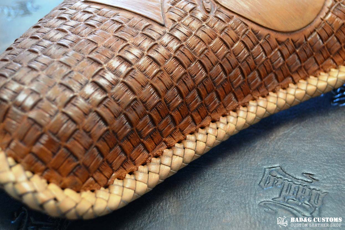 "ACE Pin-Up Girl" design hand tooled and braided on a chopper solo seat. Veg tan leather with kangaroo lace.